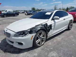 2014 BMW 6 Series 650i with VIN WBAYM9C55ED248244, listed as a IAAI auction lot 42043456 with 144,664 mi miles and . Bid and sale history available at DreamBid. Image 17.