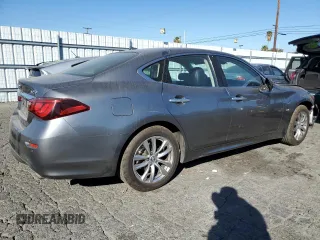 2018 Infiniti Q70 Luxe with VIN JN1BY1AR3JM220301, listed as a Copart auction lot 79569884 with 84,339 mi miles and Salvage title. Bid and sale history available at DreamBid. Image 3.