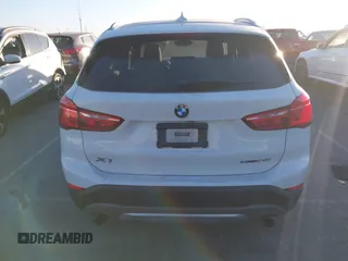 2019 BMW X1 sDrive28i z VIN WBXHU7C54K3H45462, wystawiony jako IAAI lot #41209117 z przebiegiem 52 719 mil mil oraz . Historia ofert i sprzedaży dostępna na DreamBid. Obrazek 16.