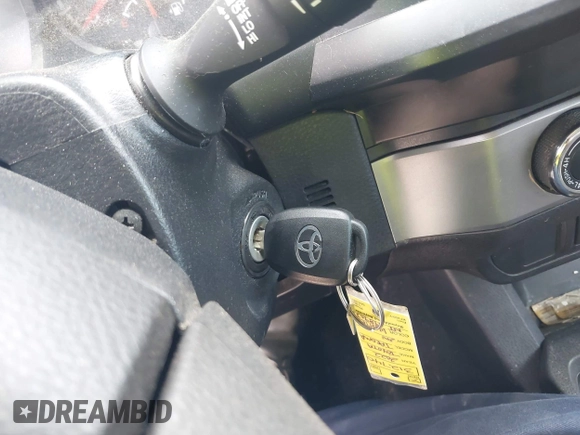 2022 Toyota Tacoma SR with VIN 3TYCZ5AN9NT098903, listed as a IAAI auction lot 42088505 with 93,000 mi miles and . Bid and sale history available at DreamBid. Image 11.