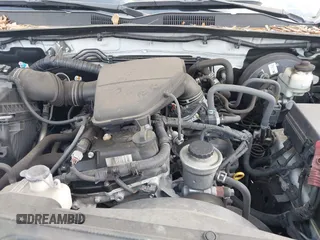 2018 Toyota Tacoma SR with VIN 5TFRX5GN6JX129435, listed as a IAAI auction lot 42205055 with 105,985 mi miles and . Bid and sale history available at DreamBid. Image 10.