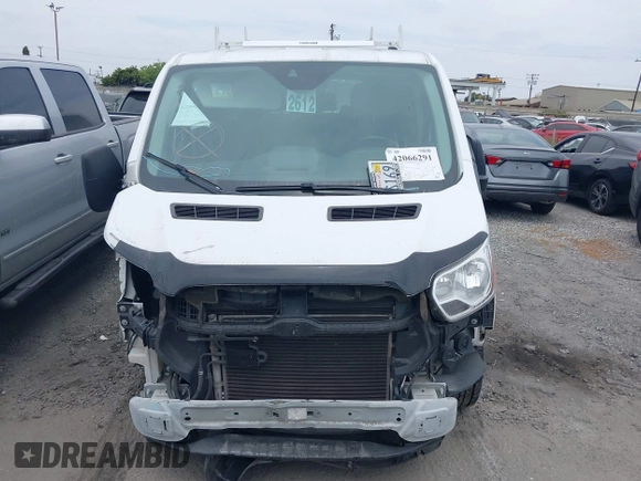 2017 Ford Transit XL z VIN 1FBZX2YM1HKA98823, wystawiony jako IAAI lot #42066291 z przebiegiem 100 011 mil mil oraz . Historia ofert i sprzedaży dostępna na DreamBid. Obrazek 13.