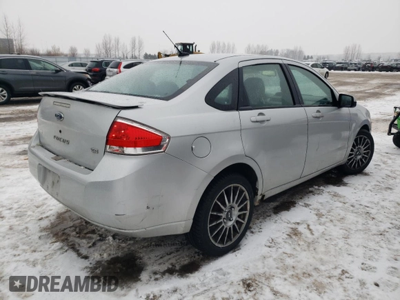 2009 Ford Focus SES with VIN 1FAHP36N19W214689, listed as a Copart auction lot 43001385 with 295,859 mi miles and Salvage Title. Bid and sale history available at carsss.com. Image 3.