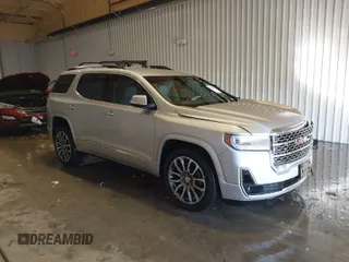 2020 GMC Acadia Denali with VIN 1GKKNXLS2LZ143441, listed as a IAAI auction lot 41609998 with 96,172 mi miles. Bid and sale history available at carsss.com. Image 1.