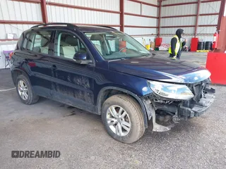 2016 Volkswagen Tiguan S with VIN WVGAV7AX5GW584747, listed as a IAAI auction lot 41853488 with 92,579 mi miles and . Bid and sale history available at DreamBid. Image 1.