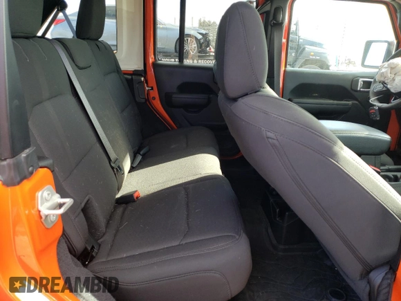2023 Jeep Wrangler Sport with VIN 1C4HJXDG8PW687459, listed as a Copart auction lot 87302924 with 16,637 mi miles and Salvage Title. Bid and sale history available at DreamBid. Image 10.