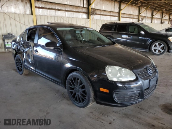 2009 Volkswagen Jetta Wolfsburg Edition with VIN 3VWRJ71K69M009385, listed as a Copart auction lot 47204505 with 176,649 mi miles and Salvage title. Bid and sale history available at DreamBid. Image 4.