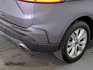 2021 Ford Edge Titanium z VIN 2FMPK3K92MBA53689, wystawiony jako IAAI lot #42501151 z przebiegiem 93 941 mil mil oraz . Historia ofert i sprzedaży dostępna na DreamBid. Obrazek 22.