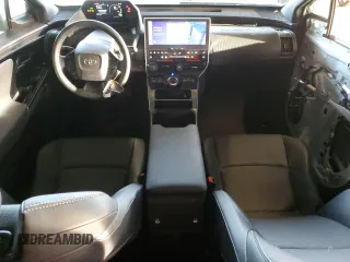 2023 Toyota bZ4X XLE with VIN JTMAAAAA7PA009698, listed as a Copart auction lot 47975935 with 15,916 mi miles and Salvage Title. Bid and sale history available at DreamBid. Image 8.
