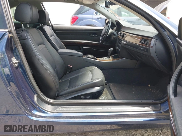 2011 BMW 3 Series 328i with VIN WBAKE3C52BE557501, listed as a IAAI auction lot 42138050 with 209,575 mi miles and . Bid and sale history available at carsss.com. Image 5.