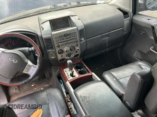 2007 Infiniti QX56 z VIN 5N3AA08A47N804400, wystawiony jako Copart lot #59031335 z przebiegiem 202 776 mil mil oraz Tytuł czysty. Historia ofert i sprzedaży dostępna na DreamBid. Obrazek 9.