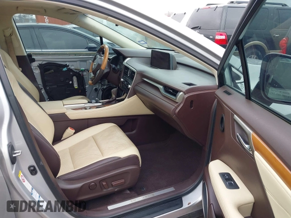 2016 Lexus RX 450h with VIN 2T2BGMCA6GC002928, listed as a IAAI auction lot 41566359 with 98,437 mi miles and . Bid and sale history available at DreamBid. Image 5.