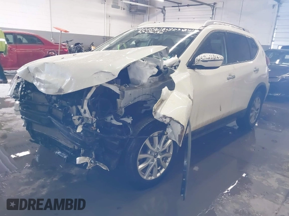 2018 Nissan Rogue SV with VIN KNMAT2MV3JP502166, listed as a IAAI auction lot 41555102 with 77,587 mi miles and . Bid and sale history available at DreamBid. Image 2.