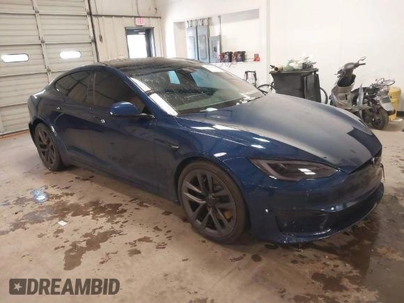 2021 Tesla Model S Plaid with VIN 5YJSA1E6XMF439884, listed as a IAAI auction lot 41622750 with Not provided miles and . Bid and sale history available at DreamBid. Image 1.