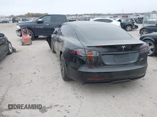 2022 Tesla Model S Plaid with VIN 5YJSA1E65NF484149, listed as a IAAI auction lot 40937538 with 11,459 mi miles and . Bid and sale history available at DreamBid. Image 3.