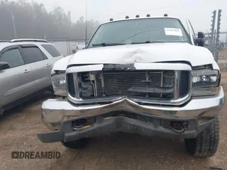 2000 Ford Super Duty F-250 XL with VIN 1FTNW21F7YEE45983, listed as a IAAI auction lot 41501845 with 329,488 mi miles. Bid and sale history available at carsss.com. Image 6.