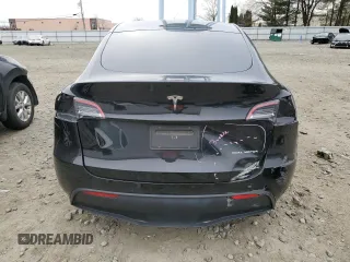 2020 Tesla Model Y Long Range with VIN 5YJYGDEE0LF045391, listed as a Copart auction lot 45642765 with 53,964 mi miles and Salvage Title. Bid and sale history available at DreamBid. Image 6.