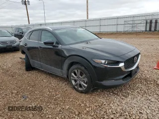 2023 Mazda CX-30 S Select with VIN 3MVDMBBM0PM562276, listed as a Copart auction lot 50411225 with 4,516 mi miles and Salvage title. Bid and sale history available at DreamBid. Image 4.