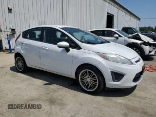 2012 Ford Fiesta SE z VIN 3FADP4EJ9CM148404, wystawiony jako Copart lot #59150695 z przebiegiem 84 705 mil mil oraz Czysty tytuł • Clean title. Historia ofert i sprzedaży dostępna na DreamBid. Obrazek 4.