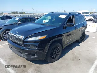 2017 Jeep Cherokee Latitude with VIN 1C4PJLCB9HW577970, listed as a IAAI auction lot 42746241 with 77,295 mi miles and . Bid and sale history available at DreamBid. Image 2.
