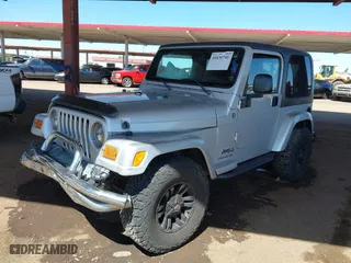 2006 Jeep Wrangler X with VIN 1J4FA39S26P767842, listed as a IAAI auction lot 41830701 with 144,204 mi miles. Bid and sale history available at carsss.com. Image 17.