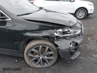 2019 BMW X2 xDrive28i with VIN WBXYJ5C50K5N03198, listed as a IAAI auction lot 41999528 with 28,949 mi miles. Bid and sale history available at carsss.com. Image 6.