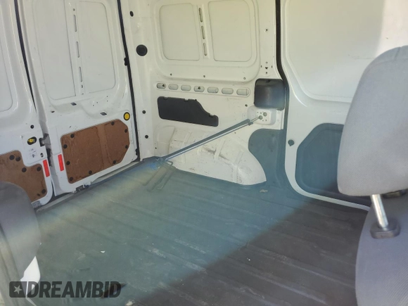 2013 Ford Transit Connect XLT z VIN NM0LS7BN2DT132347, wystawiony jako Copart lot #52025725 z przebiegiem 121 030 mil mil oraz Szkoda całkowita • Salvage title. Historia ofert i sprzedaży dostępna na DreamBid. Obrazek 11.