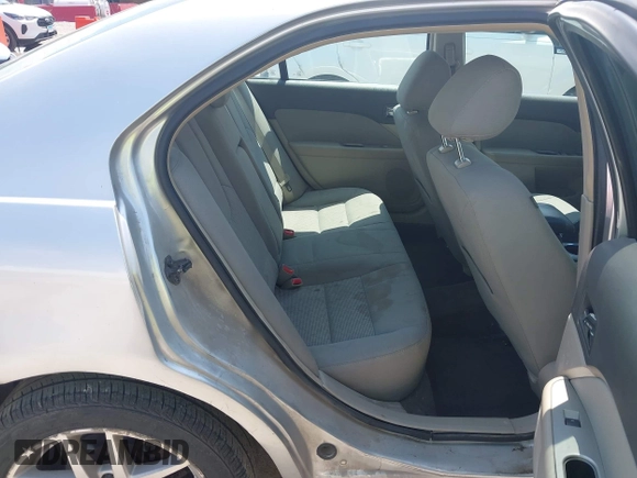 2012 Ford Fusion SEL with VIN 3FAHP0JA9CR200052, listed as a IAAI auction lot 42115789 with 141,963 mi miles and . Bid and sale history available at DreamBid. Image 8.