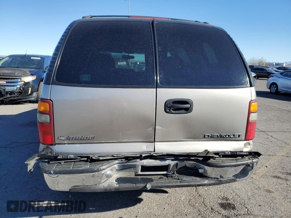 2002 Chevrolet Tahoe LS with VIN 1GNEC13V82R153063, listed as a Copart auction lot 84180594 with 148,190 mi miles and Salvage Title. Bid and sale history available at carsss.com. Image 6.