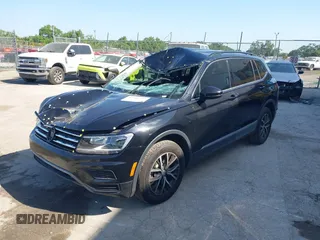 2020 Volkswagen Tiguan SE z VIN 3VV3B7AX7LM035567, wystawiony jako IAAI lot #42316223 z przebiegiem 64 730 mil mil oraz . Historia ofert i sprzedaży dostępna na DreamBid. Obrazek 2.