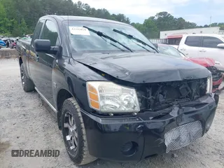 2004 Nissan Titan SE with VIN 1N6AA06A84N587135, listed as a IAAI auction lot 42343810 with 170,666 mi miles and . Bid and sale history available at DreamBid. Image 1.