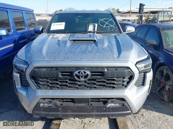 2024 Toyota Tacoma 4WD SR5 with VIN 3TMLB5JN4RM021667, listed as a IAAI auction lot 41343801 with 5,037 mi miles. Bid and sale history available at carsss.com. Image 12.