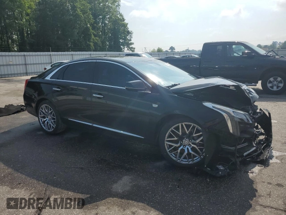 2018 Cadillac XTS Luxury with VIN 2G61N5S30J9164322, listed as a Copart auction lot 57048835 with 122,301 mi miles and Salvage title. Bid and sale history available at DreamBid. Image 4.