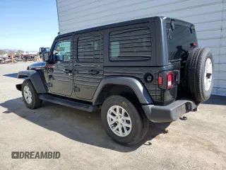 2023 Jeep Wrangler Sport with VIN 1C4HJXDNXPW701795, listed as a Copart auction lot 50451444 with 7,274 mi miles and Salvage Title. Bid and sale history available at DreamBid. Image 2.