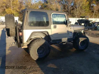 2004 Jeep Wrangler Rubicon with VIN 1J4FA69S74P787812, listed as a Copart auction lot 84715464 with 150,320 mi miles and Salvage Title. Bid and sale history available at carsss.com. Image 3.