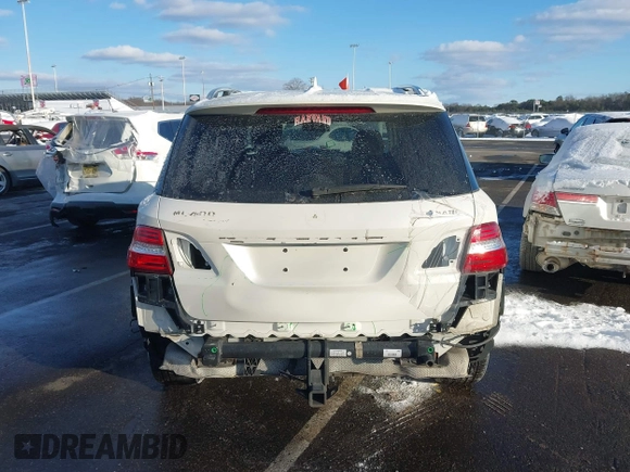 2015 Mercedes-Benz M 400 with VIN 4JGDA5GB7FA483181, listed as a IAAI auction lot 41353004 with 105,507 mi miles and . Bid and sale history available at DreamBid. Image 16.
