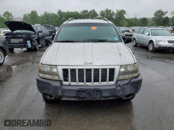 2004 Jeep Grand Cherokee Laredo z VIN 1J4GW48S74C288625, wystawiony jako Copart lot #61290805 z przebiegiem 194 615 mil mil oraz Czysty tytuł • Clean title. Historia ofert i sprzedaży dostępna na DreamBid. Obrazek 5.