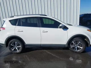 2018 Toyota RAV4 XLE with VIN JTMWFREV7JJ743297, listed as a IAAI auction lot 41579019 with 102,442 mi miles. Bid and sale history available at carsss.com. Image 13.