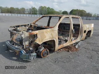 2020 GMC Sierra 1500 SLT z VIN 3GTU9DET0LG283033, wystawiony jako IAAI lot #41887798 z przebiegiem Nie podano mil oraz . Historia ofert i sprzedaży dostępna na DreamBid. Obrazek 2.