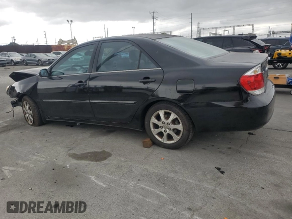 2005 Toyota Camry LE with VIN 4T1BF32K45U102615, listed as a Copart auction lot 56182705 with 196,300 mi miles and Salvage Title. Bid and sale history available at DreamBid. Image 2.
