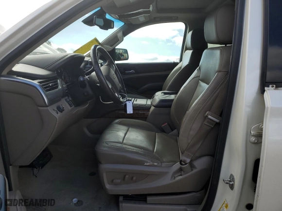 2015 Chevrolet Tahoe LTZ with VIN 1GNSCCKCXFR102314, listed as a Copart auction lot 48479825 with 218,901 mi miles and Salvage Title. Bid and sale history available at carsss.com. Image 7.