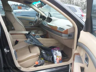 2003 BMW 7 Series 745i with VIN WBAGL63463DP61746, listed as a IAAI auction lot 41450870 with 1 miles. Bid and sale history available at carsss.com. Image 5.