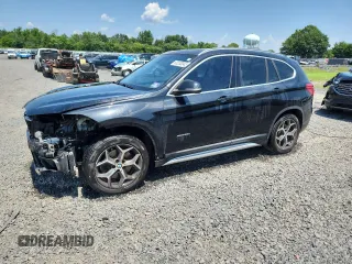 2017 BMW X1 xDrive28i with VIN WBXHT3C39H5F81018, listed as a Copart auction lot 63230045 with 101,667 mi miles and Salvage title. Bid and sale history available at DreamBid. Image 1.