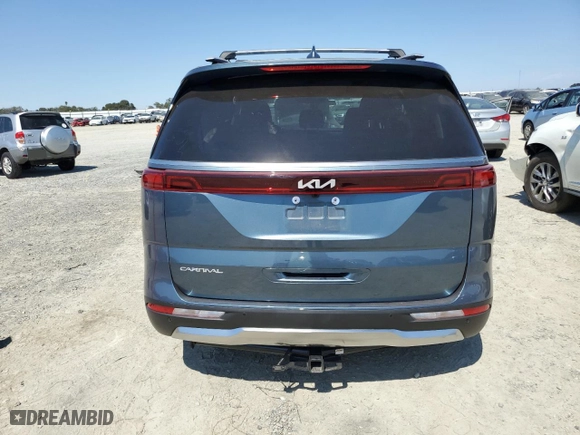 2024 Kia Carnival SX with VIN KNDNE5H32R6402454, listed as a Copart auction lot 70061644 with 7,956 mi miles and Salvage Title. Bid and sale history available at carsss.com. Image 6.