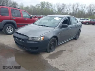 2010 Mitsubishi Lancer DE with VIN JA32U1FU7AU005962, listed as a IAAI auction lot 41927652 with 218,829 mi miles. Bid and sale history available at carsss.com. Image 2.