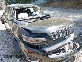 2019 Jeep Cherokee High Altitude with VIN 1C4PJMDXXKD437414, listed as a IAAI auction lot 42571769 with Not provided miles and . Bid and sale history available at DreamBid. Image 6.