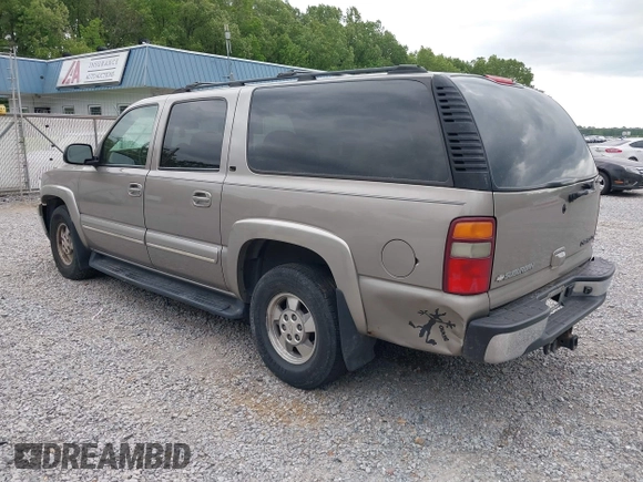 2003 Chevrolet Suburban LT z VIN 1GNEC16Z13J140136, wystawiony jako IAAI lot #42142827 z przebiegiem 252 698 mil mil oraz . Historia ofert i sprzedaży dostępna na DreamBid. Obrazek 3.