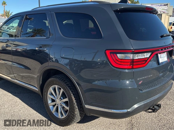 2018 Dodge Durango SXT with VIN 1C4RDJAG0JC111239, listed as a Copart auction lot 56432955 with 146,497 mi miles and Clean Title. Bid and sale history available at DreamBid. Image 3.