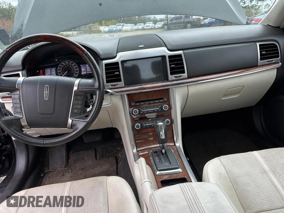 2011 Lincoln MKZ Hybrid with VIN 3LNDL2L33BR759329, listed as a Copart auction lot 42415245 with 131,927 mi miles and Clean Title. Bid and sale history available at carsss.com. Image 9.