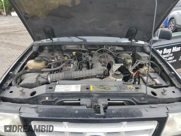 2003 Ford Ranger XL with VIN 1FTYR10DX3PB80133, listed as a Copart auction lot 58428325 with 150,617 mi miles and Salvage title. Bid and sale history available at DreamBid. Image 11.